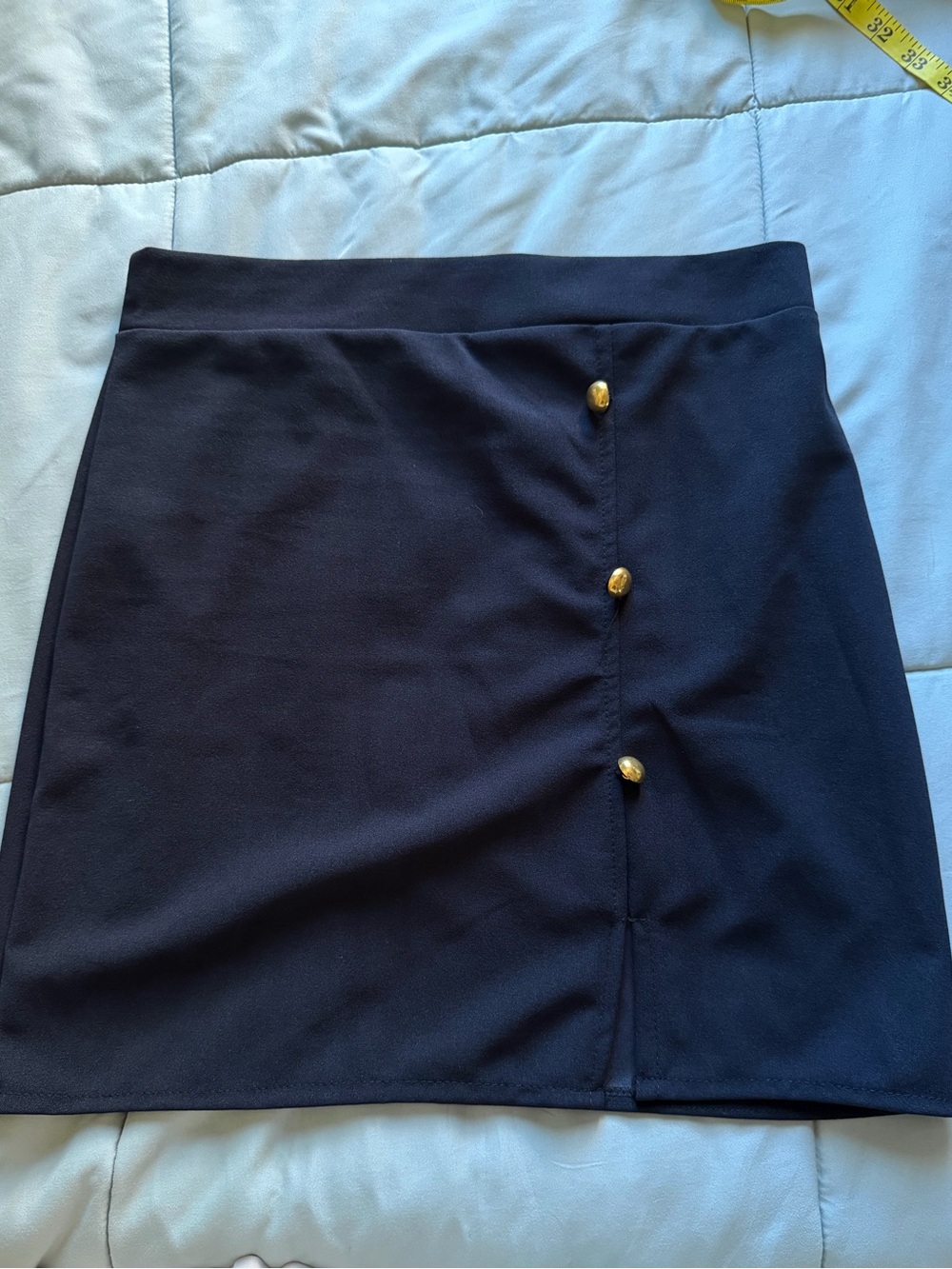 Black Women's Mini Skirt with Gold Button